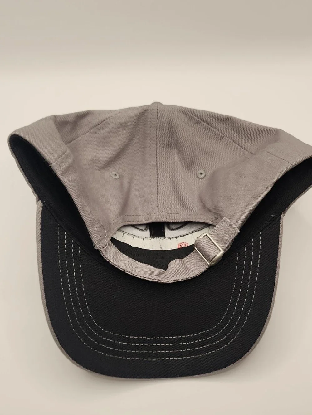 Gray Baseball Cap with Black Patch and Red Accent